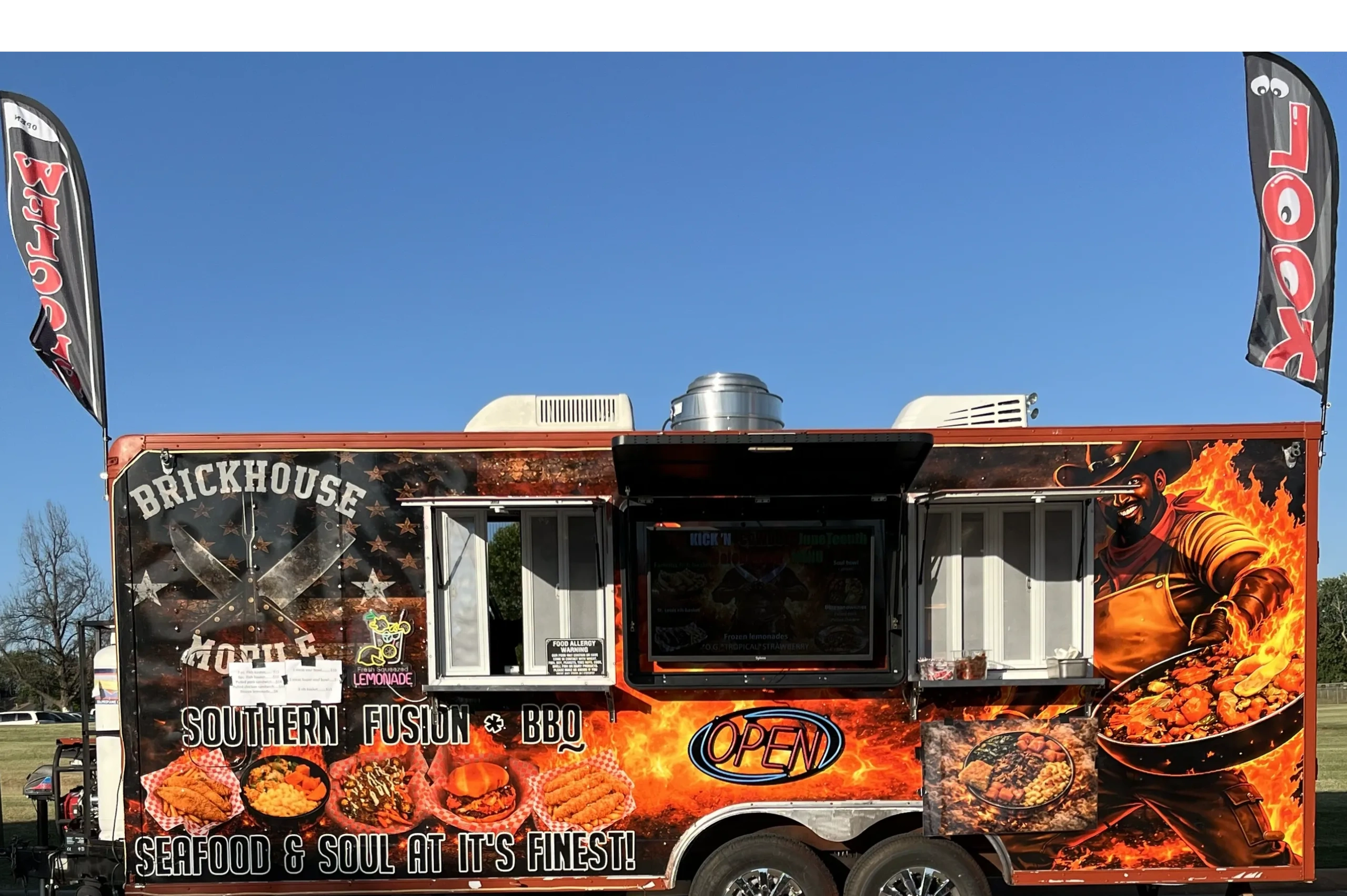Food truck with vibrant BBQ and Southern fusion theme.