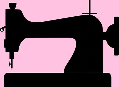A black sewing machine with a pink background.