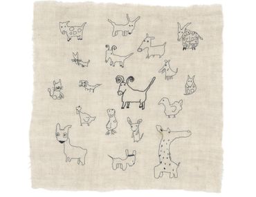 animals embroidered with black thread onto linen