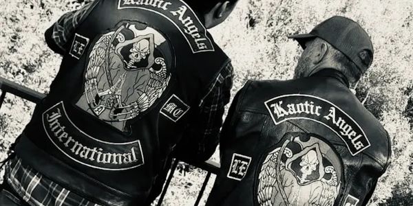 Two people wearing Kantic Angels jackets with grim reaper patches.