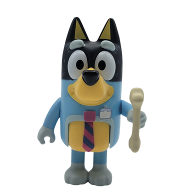 Bluey toy figure holding a bone-shaped object.