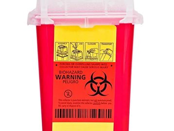 Red biohazard sharps container with warning labels.
