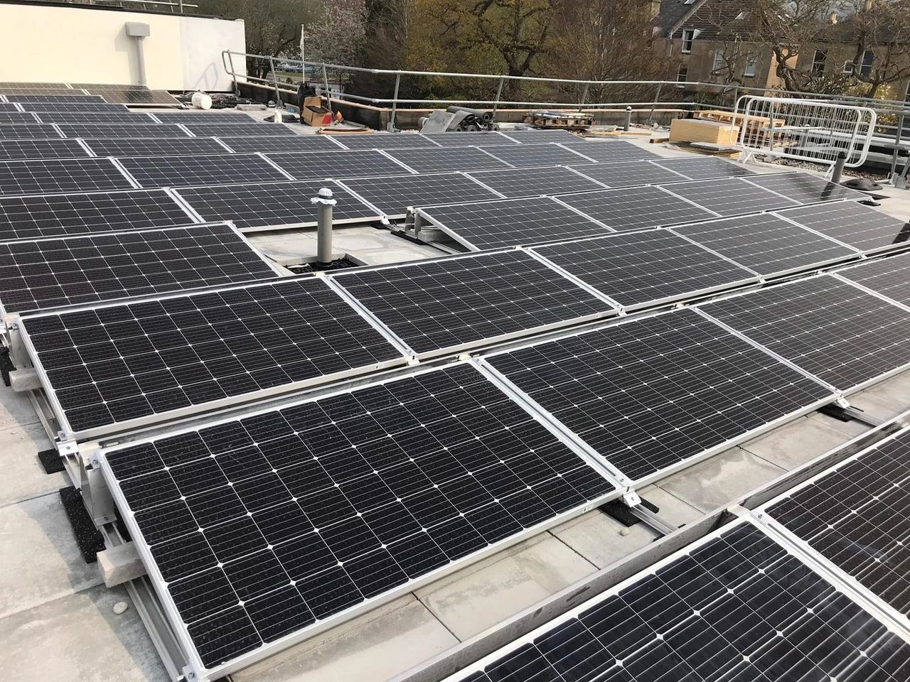 Flat roofs can be more expensive for solar due to ballasted mounting systems (Image: Photon Energy)