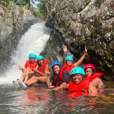 People having fun at the river at El Yunque at Rio Grande, Puerto Rico