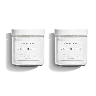 HERBIVORE Coconut Milk Bath Soak jar with hydrating, plant-based formula.