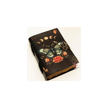 Vintage Luna Moth embossed leather grimoire journal with clasp lock and deckle-edge pages.