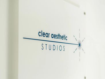 Logo of Clear Aesthetic Studios on a white surface.