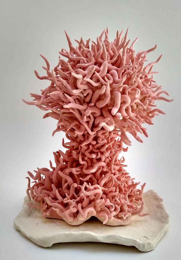 handmade unique fragile ceramic coral-looking sculpture in light pink matt glaze finish