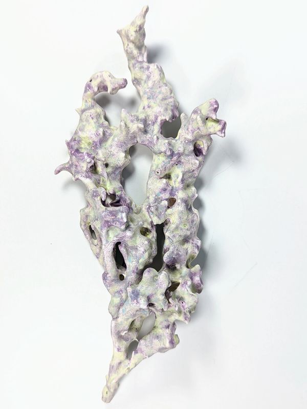ceramic branch sculpture with green and purple matt glaze