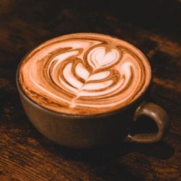 houston texas specialty Minimalist coffee setup with latte and pastries, trendy coffee shop branding