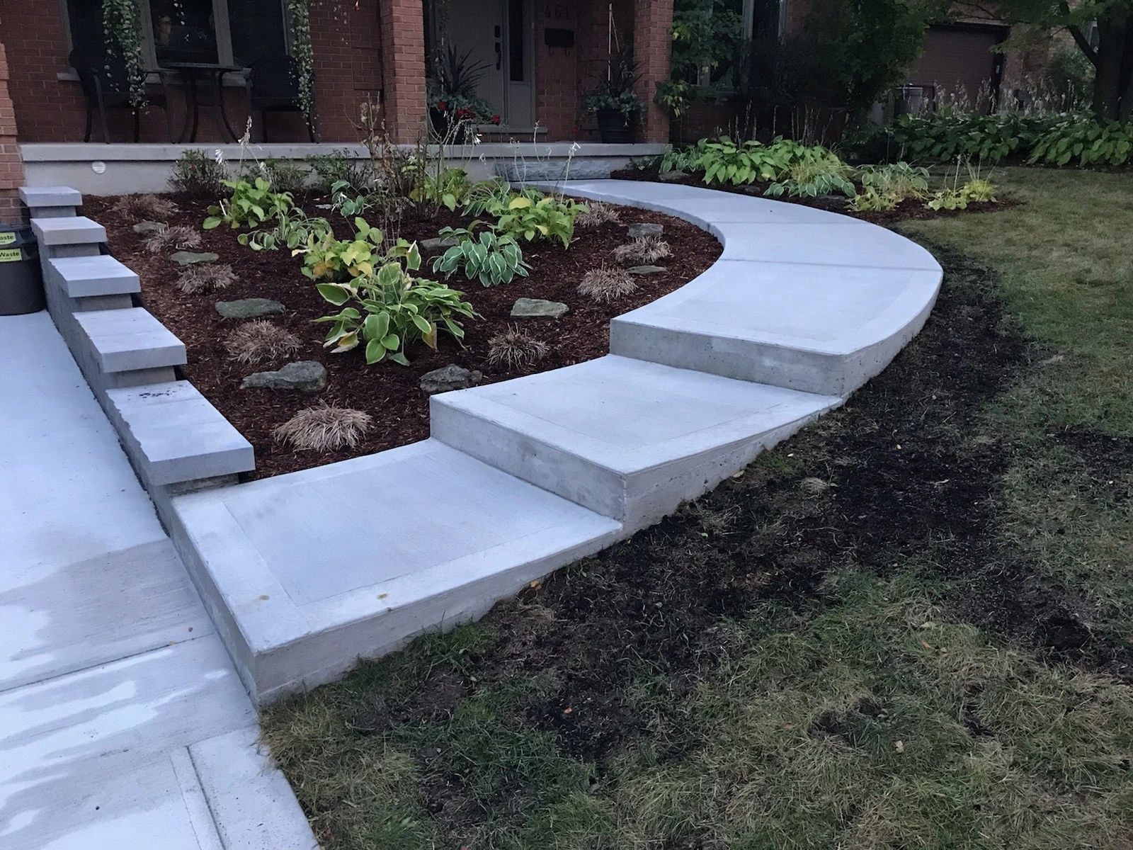 Garden wrap front concrete walkway/stairs