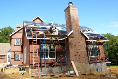 SOLAR PANELS BEING INSTALLED ON A ROOF IN CHARLESTON SC