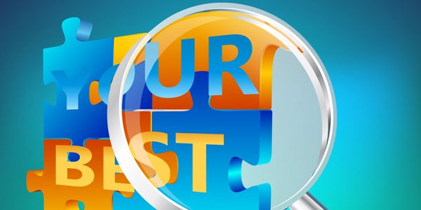 a magnifying glass zooming in on a portion of text on a puzzle readying YOUR BEST