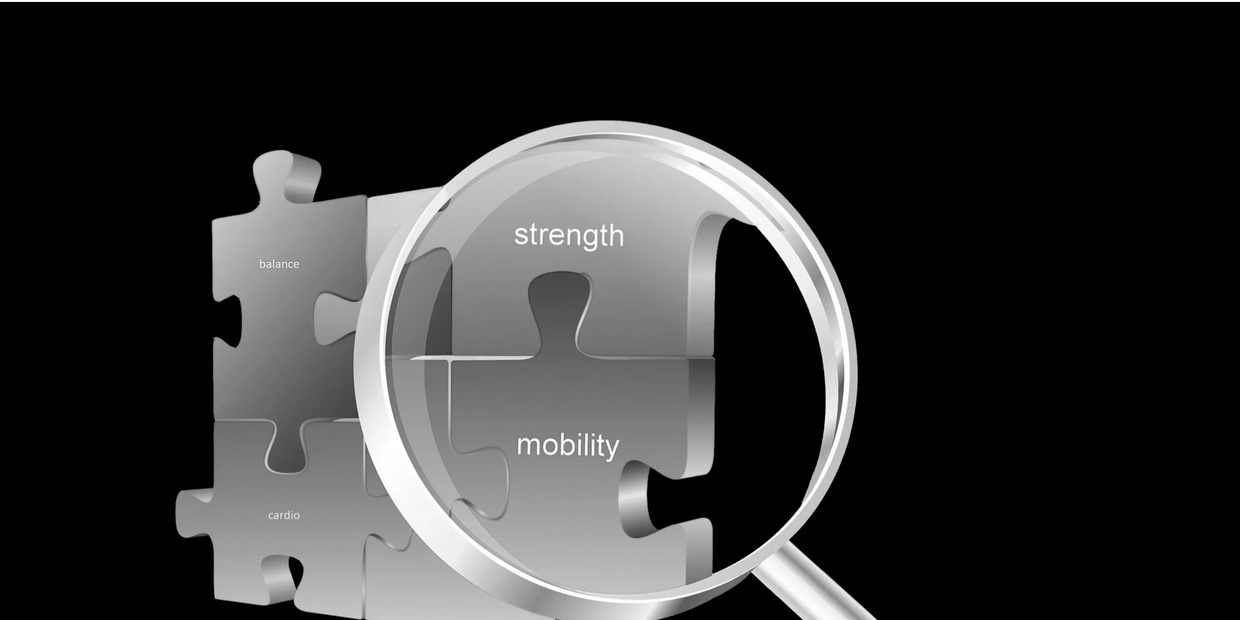 magnifying glass zooming in on test of a puzzle that reads mobility and strength