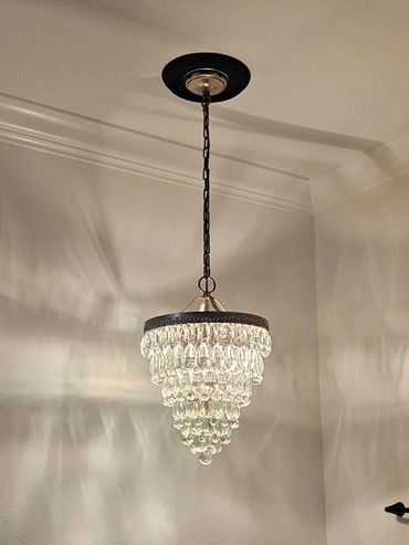chandelier in bathroom