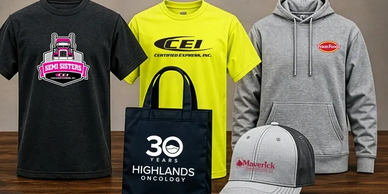 Various branded apparel and tote bag displayed together.