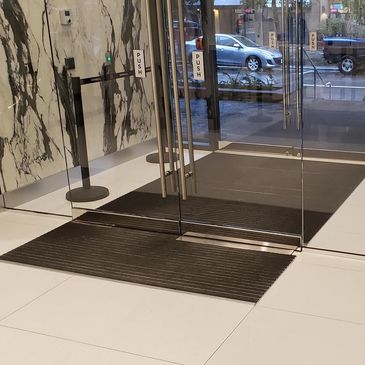 Modern floor mat at the entrance of a high end building