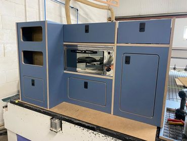 Custom kitchen pod to include top loading fridge and Dometic gas grill.