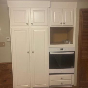 New pantry, microwave, and wall oven cabinet, trimmed out