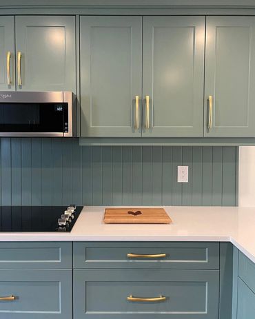 Brushed gold hardware, built in induction cook top, and wonderful cabinetry. in waterloo, ontario