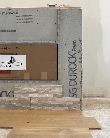 Fireplace mock up with flooring and stone