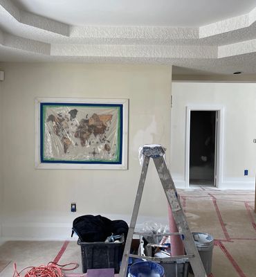 Protecting some treasured wall art in a main floor renovation we completed 