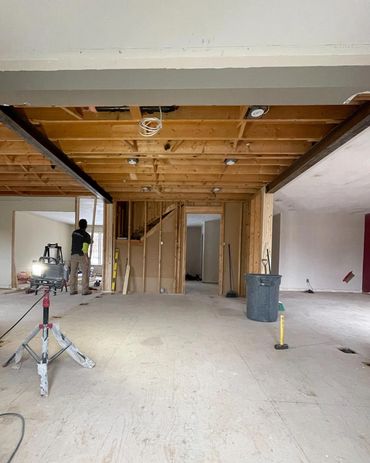 2 new steel beams installed where 2 load bearing walls were previously. making a nice open concept