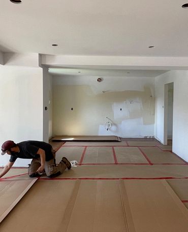 Protecting a newly laid hardwood floor, prepared for the next phase!