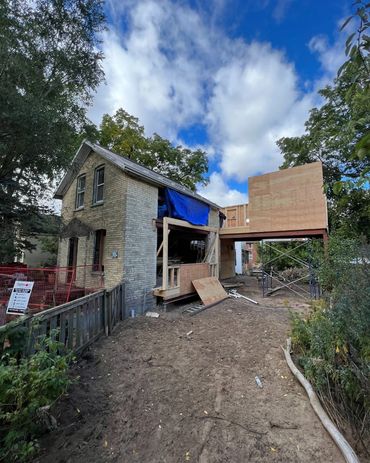 A midtown Kitchener addition and kitchen bump out being framed
