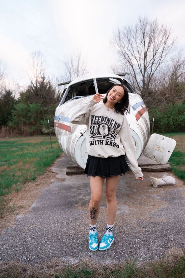asian girl in a crewneck