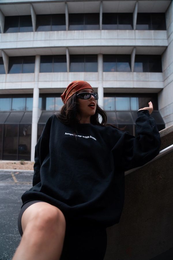 girl in black crewneck