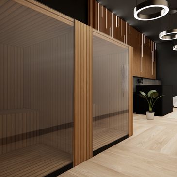 Modern sauna room with wooden panels and glass doors in a stylish interior.