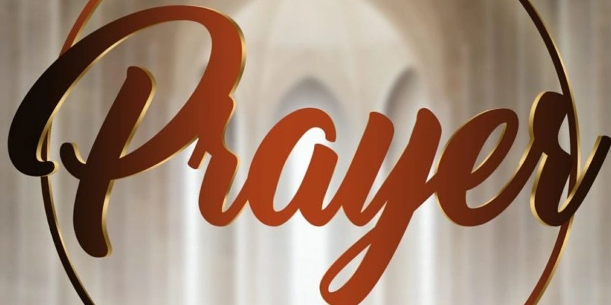 The word 'Prayer' in elegant script with a soft background.