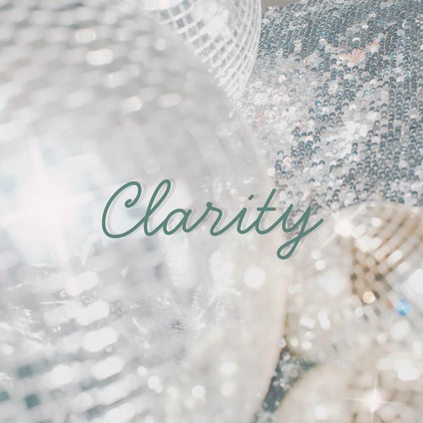 Sparkling disco balls with the word 'Clarity' overlaid in elegant script.