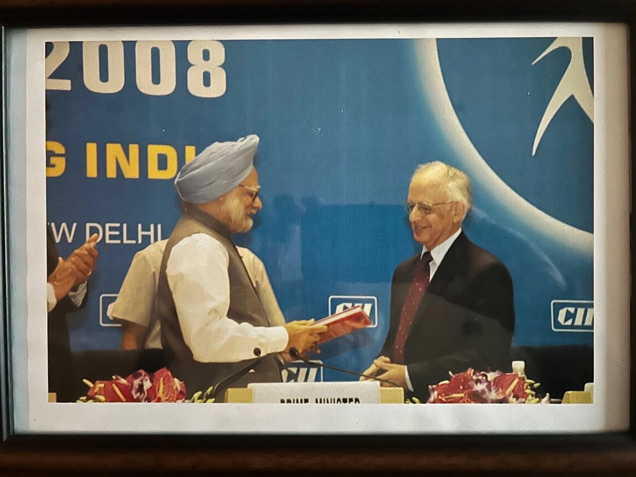 The Prime Minister receives the first copy of 'Transfoming Capitalism'