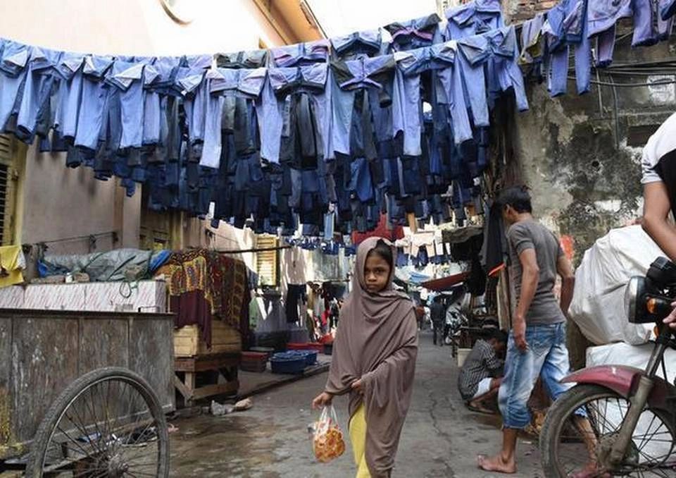 A second-hand clothes market in Kolkata.   | Photo Credit: NurPhoto