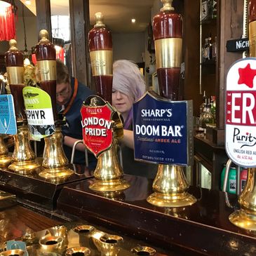 A line-up of hand-drawn beers.