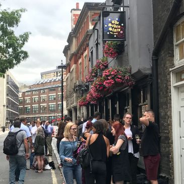 Outside a London Pub after work.