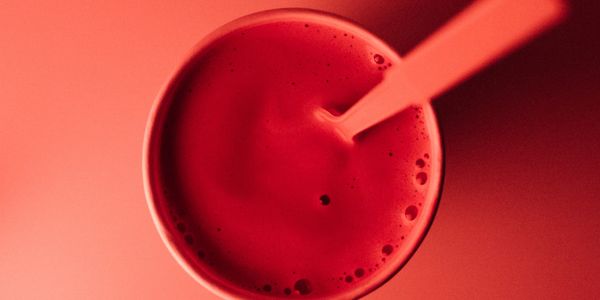 RED MUG ON RED Photo by Matthew Hamilton on Unsplash