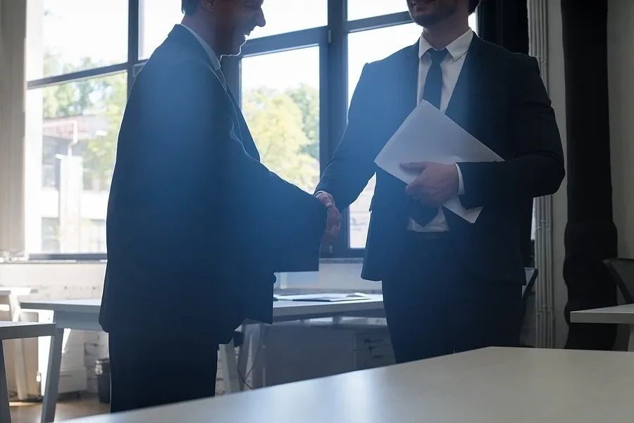 Two Unrecognizable Business Man Shake Hand Agreement 