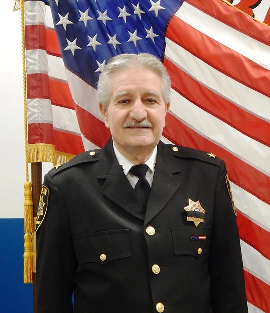 Click Photo to Link for SCPD Obituary for Rev. D'Angelo