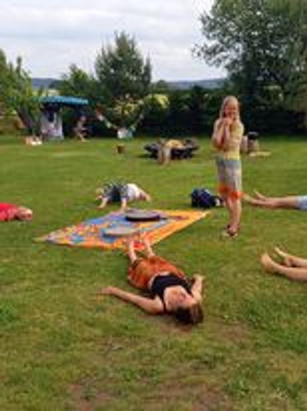 Leading a guided meditation at a retreat