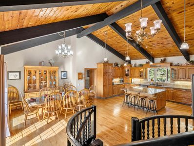 Large kitchen and dining room with large table to seat 10 guests