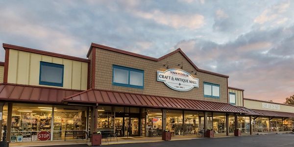 Welcoming exterior view of Town Peddler Craft & Antiques mall located in Livonia, Michigan.