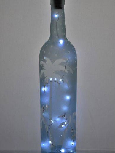 Palm Tree wine bottle with fairy lights.