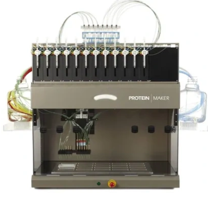 A protein maker machine with multiple tubes and dispensers for processing.