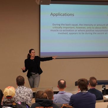 Amy Ashmore lecturing live.