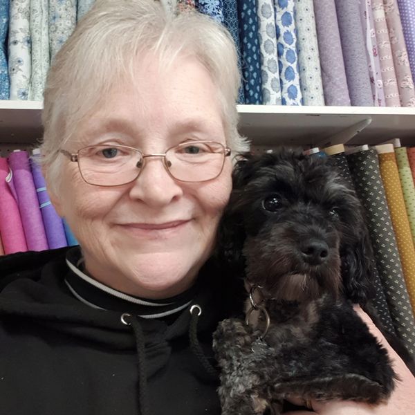 Meet Winnie our 2 yr old Caver-poo. Winnie loves hugs with everyone she meets. Bouncy fun loving lit