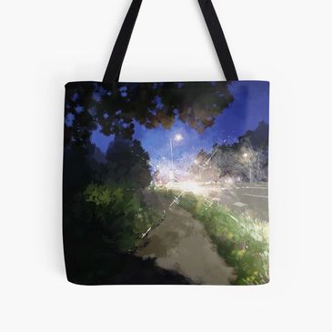 A photo of a bag showing a painting of a nightly road viewed from the sidewalk - blinding car lights