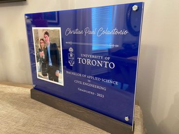 Custom and personalized graduate gift plaque, laser engraved and cut on acrylic with wood base